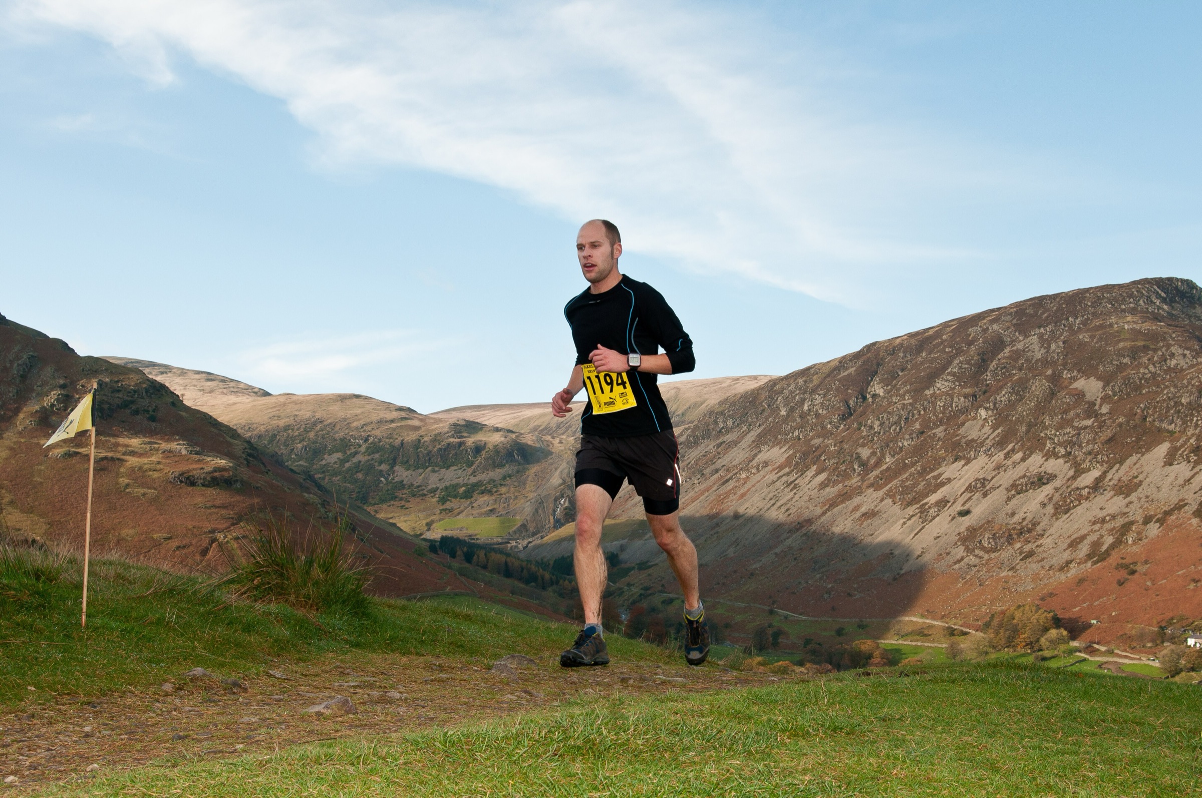 Runners on a mountain trail